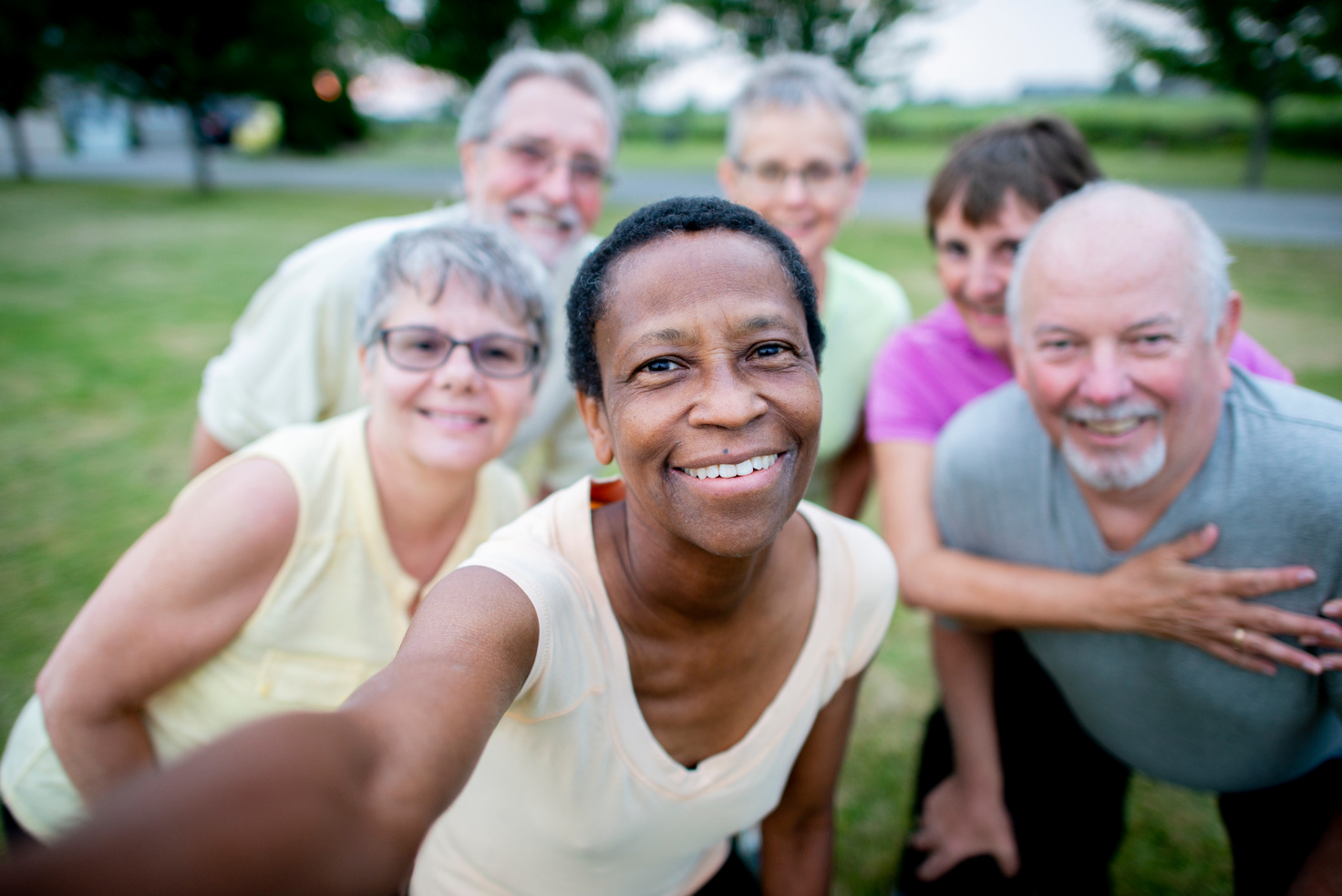 Diverse group of senior citizens exercising together